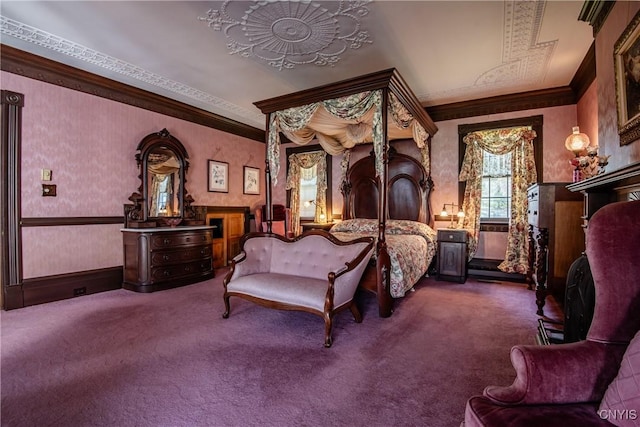 carpeted bedroom with ornamental molding and wallpapered walls