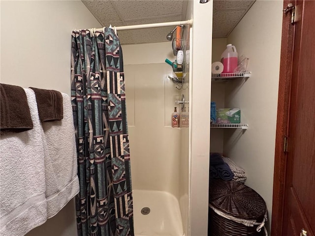 bathroom featuring a shower stall
