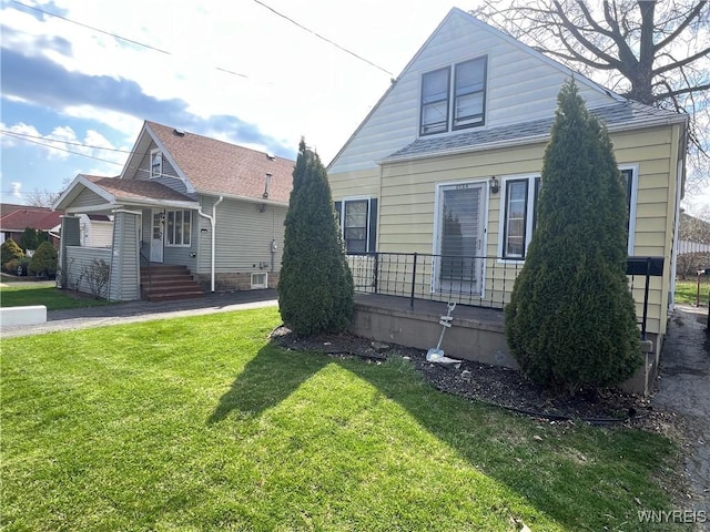 bungalow with a front lawn