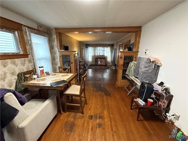 dining space featuring wood-type flooring