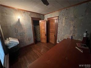 unfurnished bedroom featuring wood finished floors