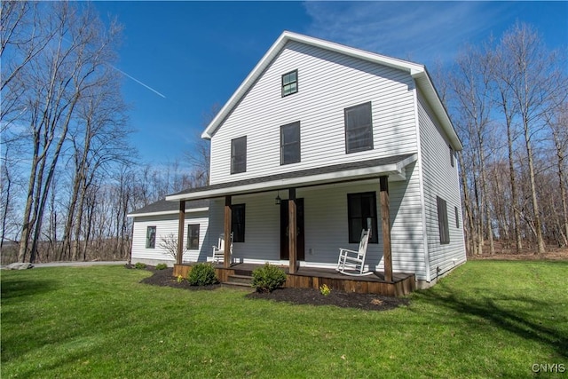 view of front facade with a porch and a front yard