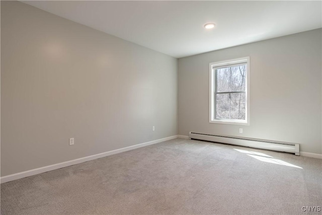 30372 Hadley Rd, Rutland, NY 13612 - empty room featuring baseboards, light colored carpet, and a baseboard radiator
