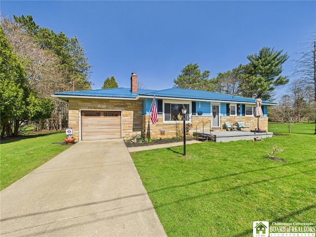 ranch-style home featuring driveway, stone siding, a chimney, a front lawn, and a garage