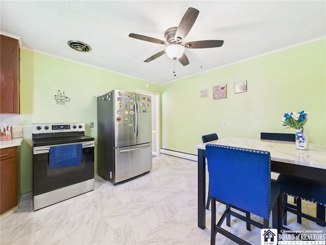 kitchen featuring a baseboard heating unit, appliances with stainless steel finishes, light countertops, ceiling fan, and crown molding