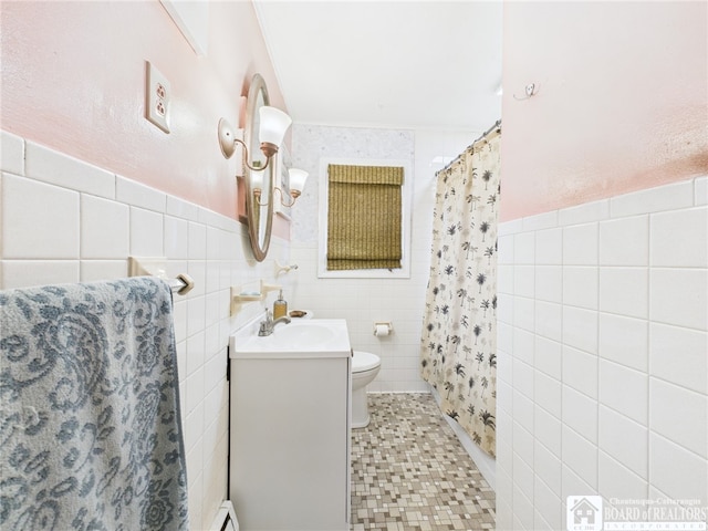 bathroom featuring tile walls, curtained shower, toilet, and vanity