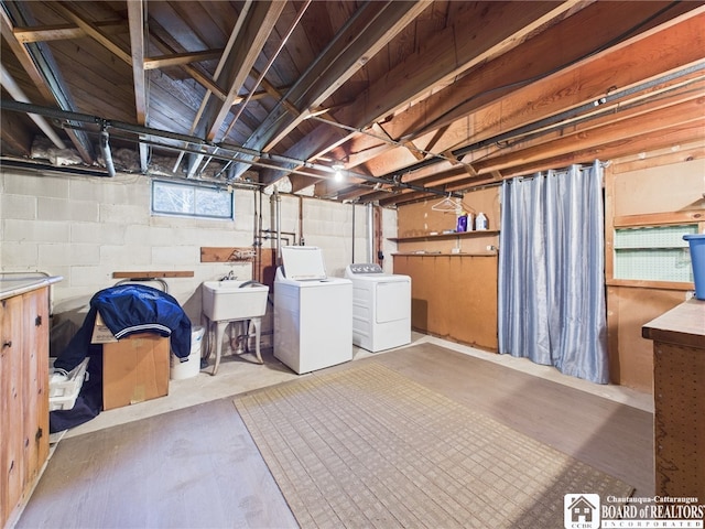 basement with separate washer and dryer