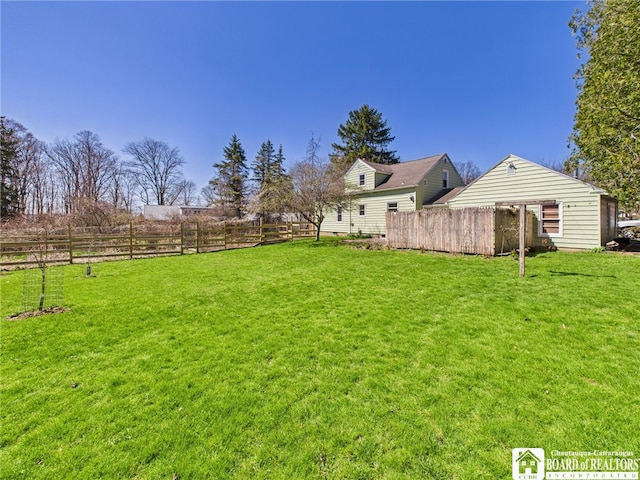 view of yard featuring fence