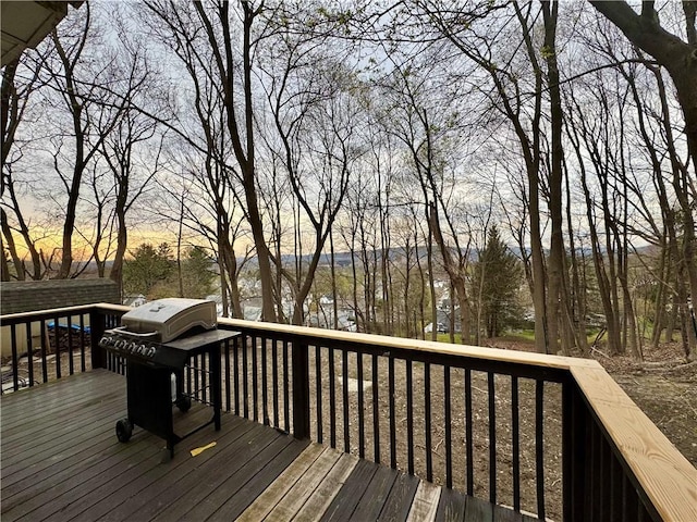 wooden deck with grilling area