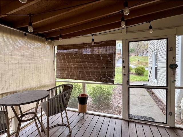 sunroom / solarium featuring plenty of natural light