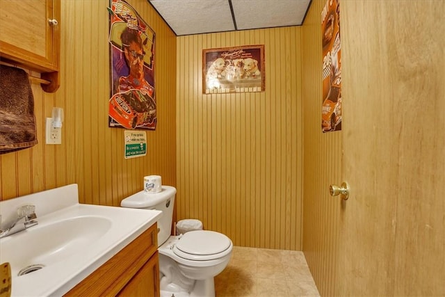 394 Nersesian Rd, Otsego, NY 13348 - half bath with vanity, tile patterned flooring, and toilet