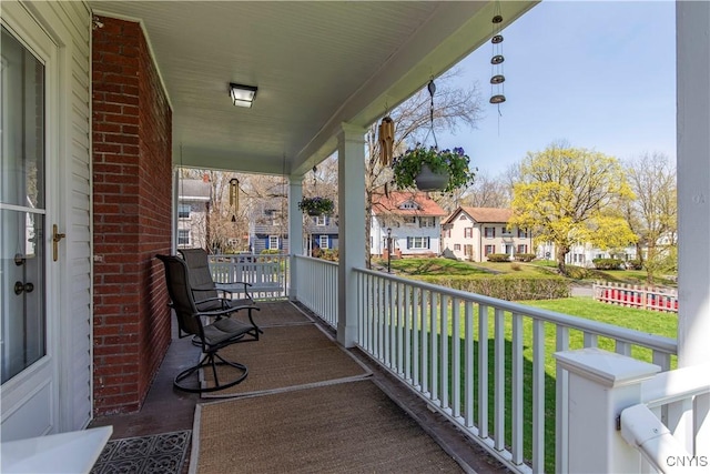 117 Proctor Blvd, Utica, NY 13501 - balcony with covered porch and a residential view