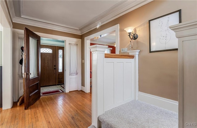 117 Proctor Blvd, Utica, NY 13501 - foyer entrance featuring baseboards, crown molding, and light wood finished floors