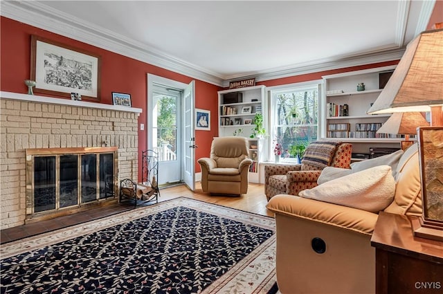 117 Proctor Blvd, Utica, NY 13501 - living room featuring ornamental molding, wood finished floors, and a fireplace