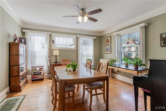 117 Proctor Blvd, Utica, NY 13501 - dining space featuring plenty of natural light, light wood-style flooring, and crown molding