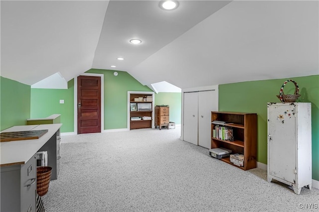 117 Proctor Blvd, Utica, NY 13501 - additional living space with baseboards, recessed lighting, light colored carpet, and lofted ceiling