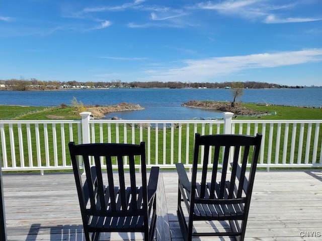 28278 Stony Point Rd, Cape Vincent, NY 13618 - wooden terrace featuring a lawn and a water view