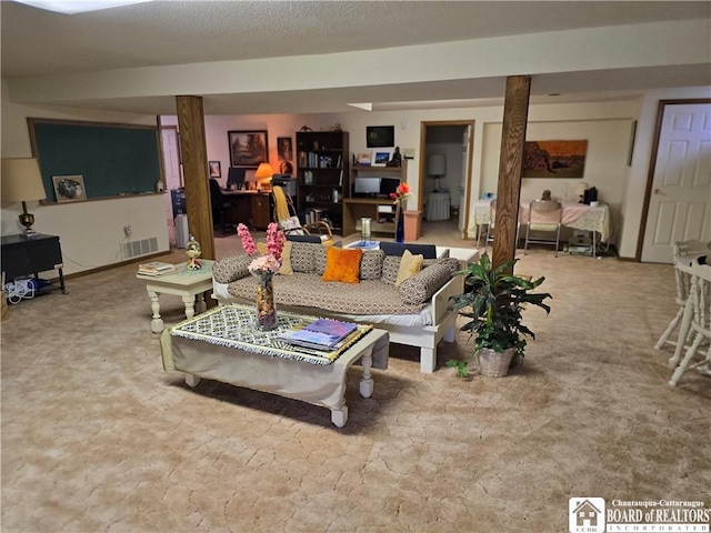 living room featuring visible vents and carpet
