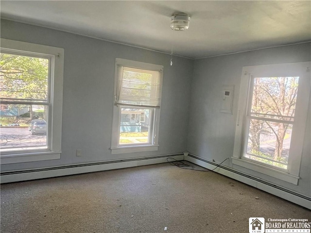 unfurnished room with a healthy amount of sunlight and carpet flooring