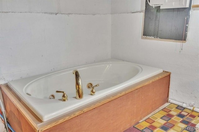 bathroom featuring a whirlpool tub