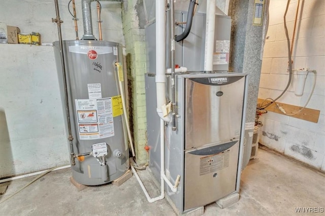 utility room featuring gas water heater