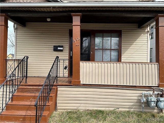 doorway to property with covered porch