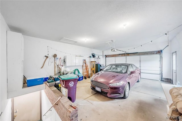 garage featuring a garage door opener