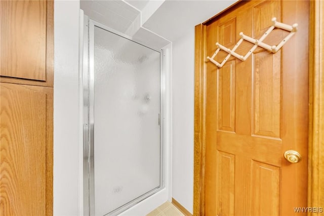 bathroom with a stall shower