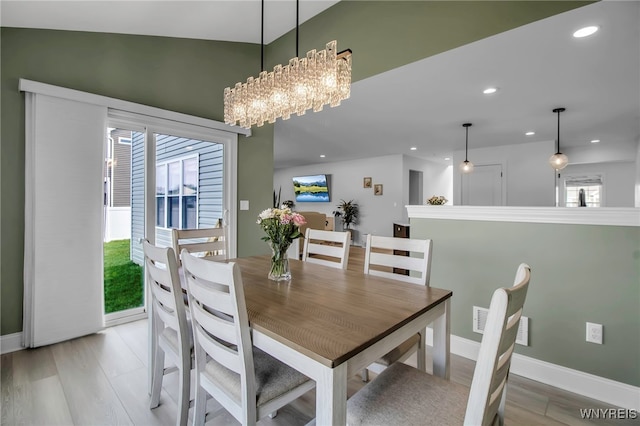 dining room featuring an inviting chandelier, visible vents, recessed lighting, and baseboards