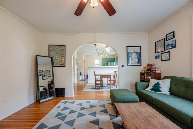 72 Whiteford Rd, Rochester, NY 14620 - living area featuring visible vents, wood finished floors, a ceiling fan, and arched walkways