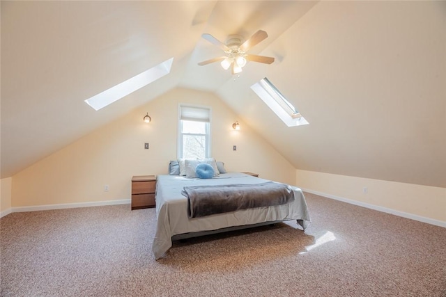 72 Whiteford Rd, Rochester, NY 14620 - carpeted bedroom featuring lofted ceiling with skylight, ceiling fan, and baseboards