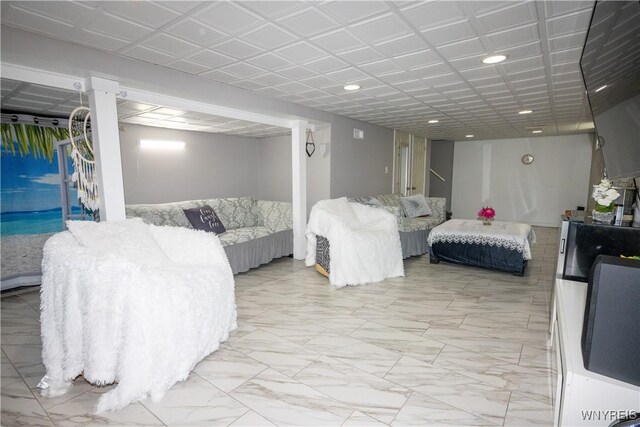 interior space with recessed lighting and marble finish floor
