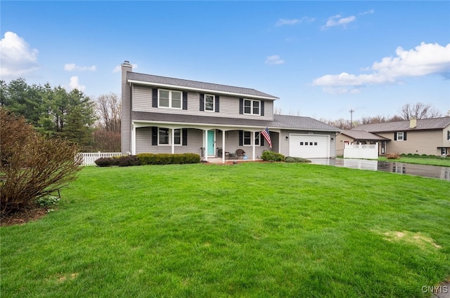 view of front of home featuring a chimney, an attached garage, fence, a porch, and a front lawn