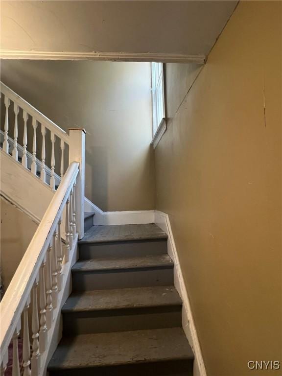staircase with baseboards