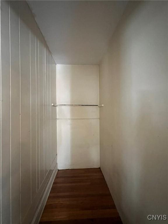 hall with wood finished floors