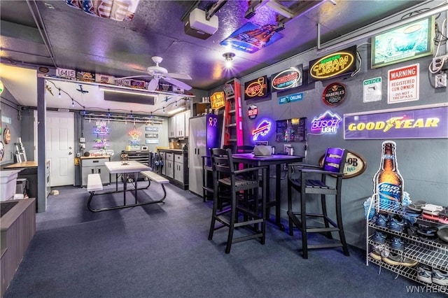 game room with ceiling fan