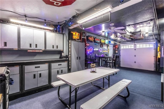 interior space featuring ceiling fan