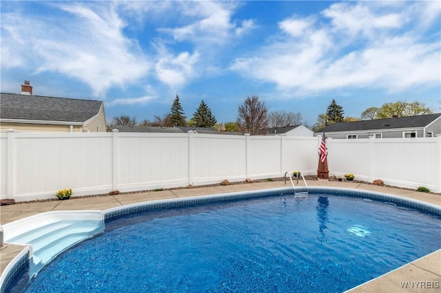 view of pool featuring a fenced backyard and a fenced in pool