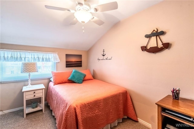bedroom with lofted ceiling, a ceiling fan, carpet flooring, and baseboards
