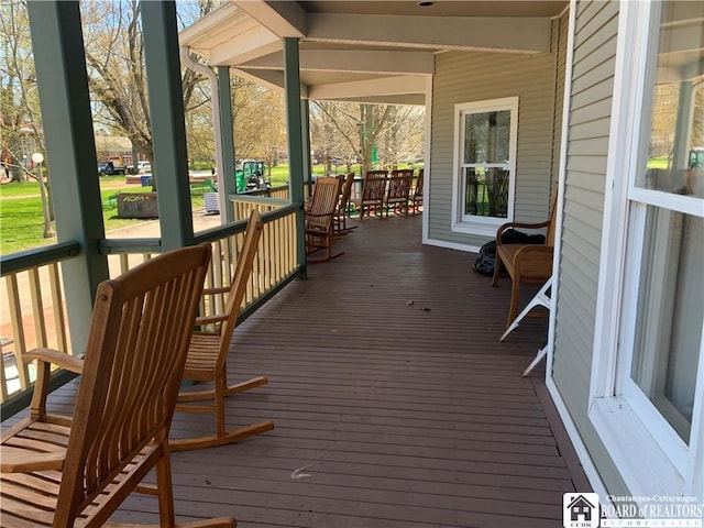 wooden deck with covered porch