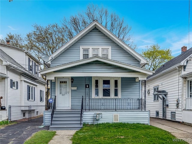 view of front of property featuring covered porch