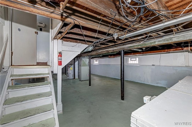basement with heating unit and water heater
