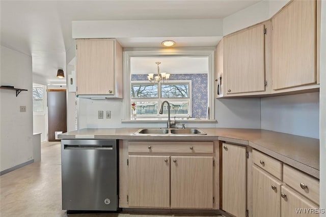 kitchen with light brown cabinetry, dishwasher, light countertops, and a sink