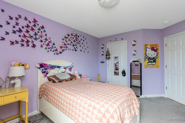 bedroom featuring baseboards and light colored carpet
