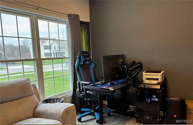 home office with wood finished floors