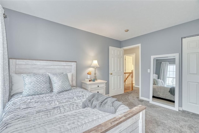 bedroom featuring baseboards and carpet floors