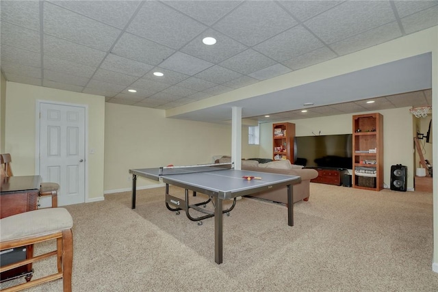 rec room featuring a drop ceiling, recessed lighting, baseboards, and carpet floors