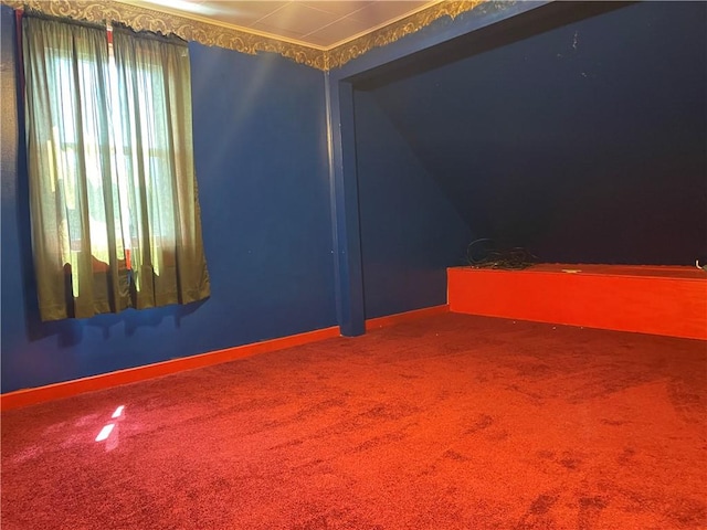 unfurnished room featuring carpet flooring