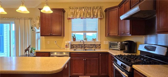 kitchen featuring a toaster, stainless steel appliances, under cabinet range hood, light countertops, and a sink
