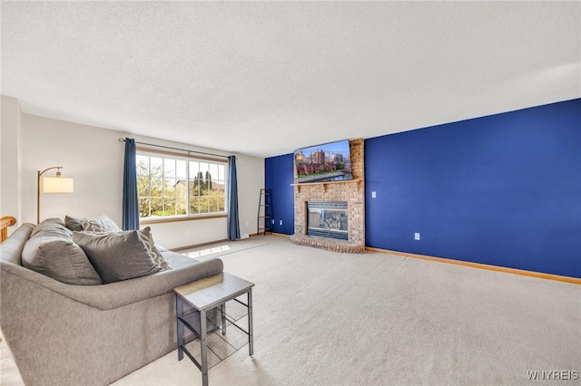 carpeted living room featuring a brick fireplace, a textured ceiling, and baseboards